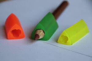 Ergonomische Stifthalter / Schreibhilfen